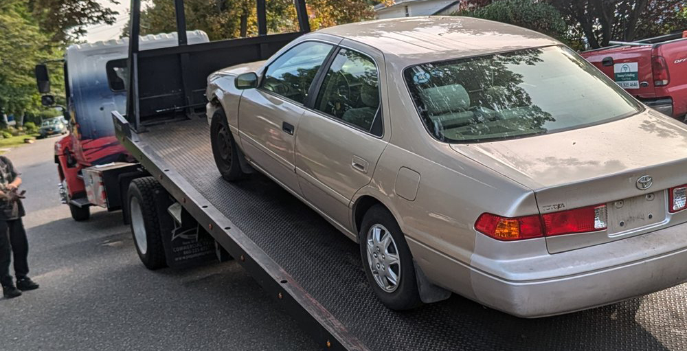 Indiana Junk Cars team buying a junk car for cash